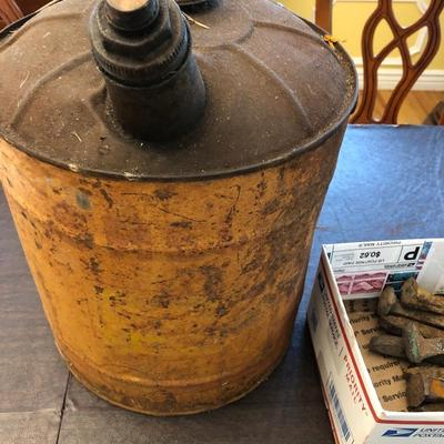 Vintage oil and gas can and 12+ rusty railroad spikes