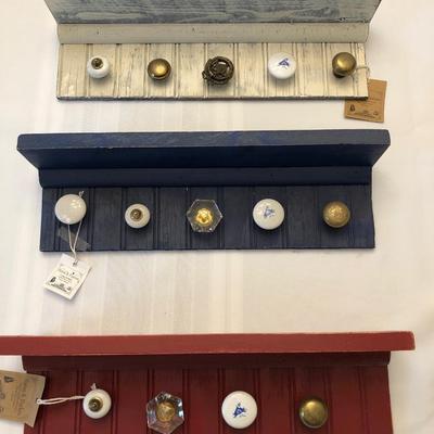 Red, White, and Blue Decorative Shelves with Knobs