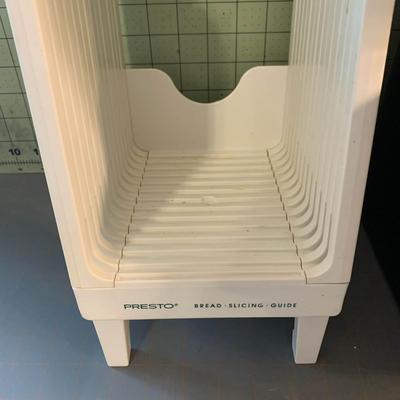 Storage container + Colander + Bowl Holder + Bread Slicer