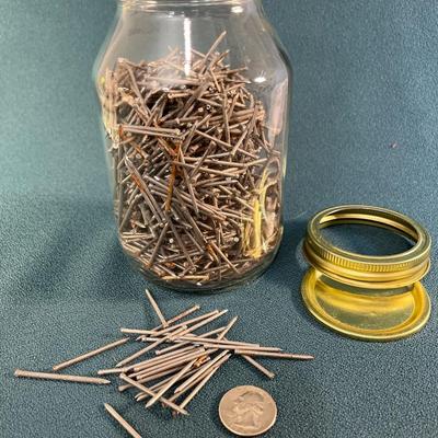 JAR FULL OF 1-1/2â€ FINISHING NAILS