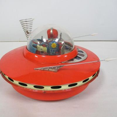 Battery Powered Flying Saucer With Pilot | EstateSales.org