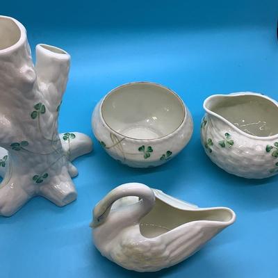 BELLEEK POTTERY HANDMADE IN IRELAND 4 pieces in this lot Swan Cream, Trunk Vase, Cream and Sugar