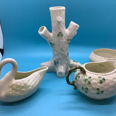 BELLEEK POTTERY HANDMADE IN IRELAND 4 pieces in this lot Swan Cream, Trunk Vase, Cream and Sugar