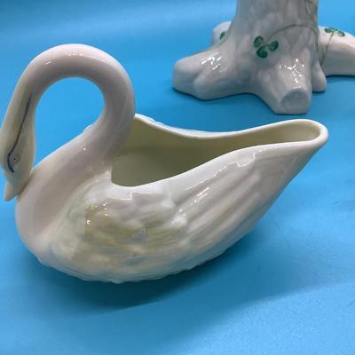 BELLEEK POTTERY HANDMADE IN IRELAND 4 pieces in this lot Swan Cream, Trunk Vase, Cream and Sugar