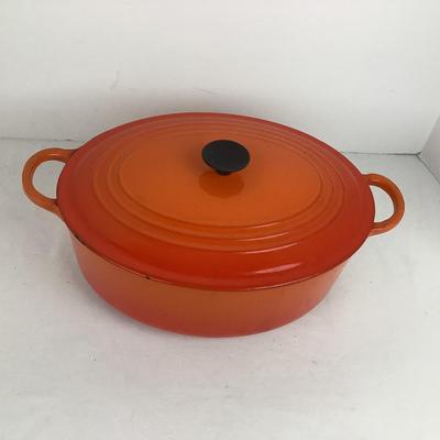 1012 Vintage Le Creuset "E" Flame Oval Orange Dutch Oven
