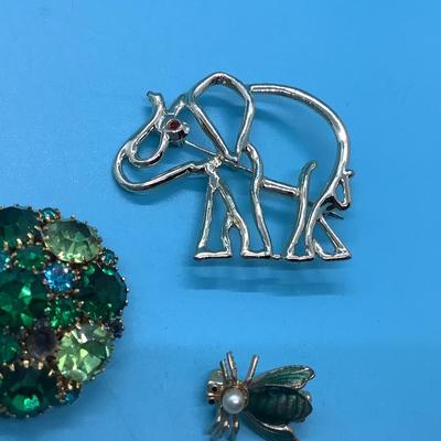 Costume Jewelry 5 pins elephant, bug, world, Shepard's hook, green sparkly round