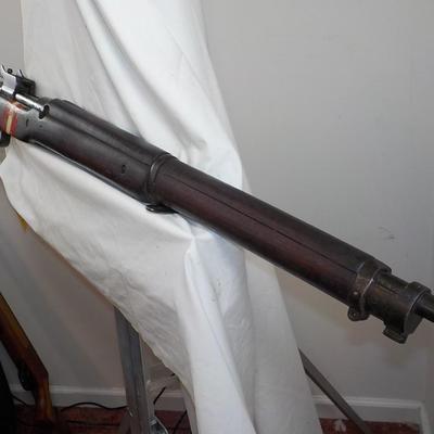 British Enfield 303 / P14 army rifle. $200 to $800.