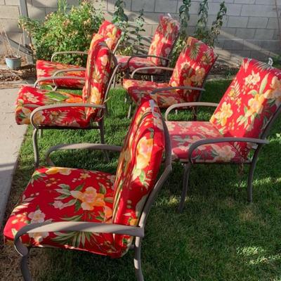 6 Patio Chairs with red/yellow/green cushions
