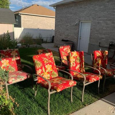 6 Patio Chairs with red/yellow/green cushions