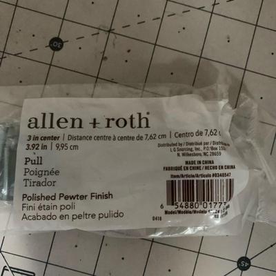 Allen + Roth polished pewter doorknobs