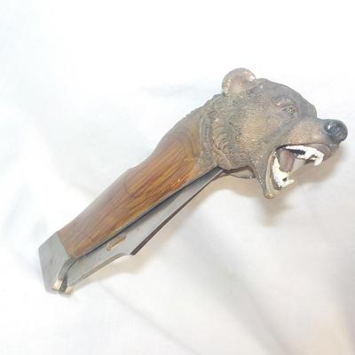 Brown Bear folding knife hand crafted. Stainless steel. est. $15 to $50.