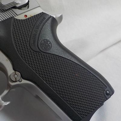 Smith & Wesson model 6906, 9mm pistol. est. $300 to $500.