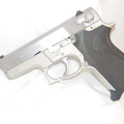 Smith & Wesson model 6906, 9mm pistol. est. $300 to $500.