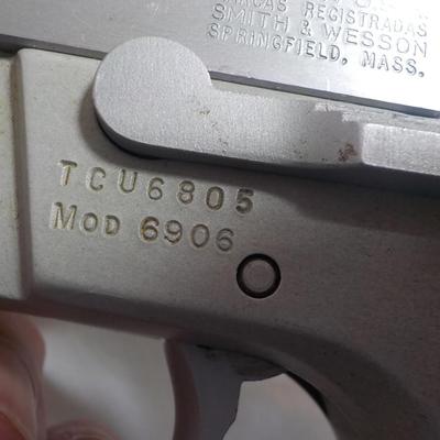 Smith & Wesson model 6906, 9mm pistol. est. $300 to $500.