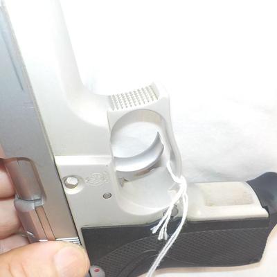 Smith & Wesson model 6906, 9mm pistol. est. $300 to $500.