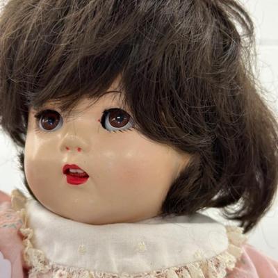 Hard Plastsic Doll in pink dress
