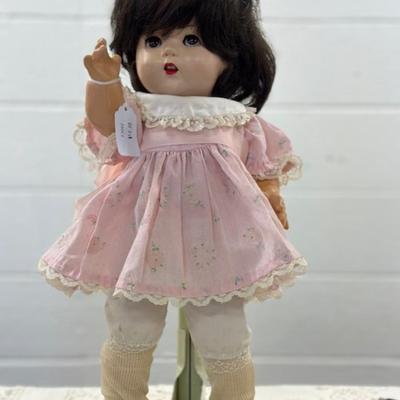 Hard Plastsic Doll in pink dress