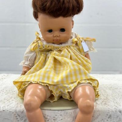 Plastic Baby Doll in Yellow Dress