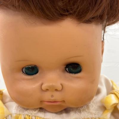 Plastic Baby Doll in Yellow Dress