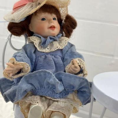 Small Porcelain Doll w/white metal table and 3 chairs