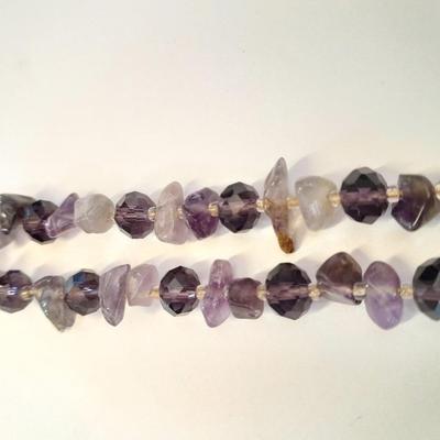 Three beaded necklaces one with matching bracelets