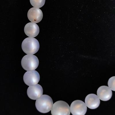 Three beaded necklaces one with matching bracelets