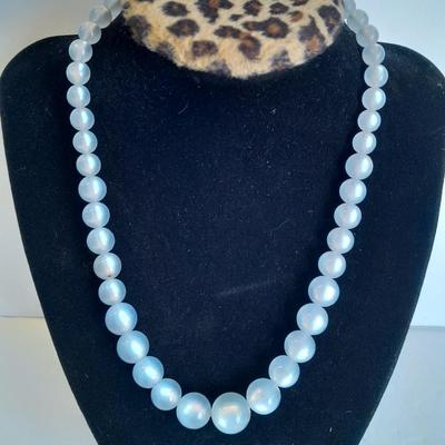 Three beaded necklaces one with matching bracelets