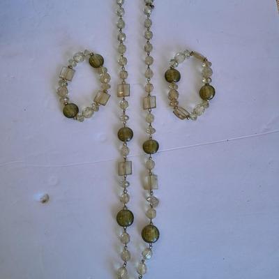 Three beaded necklaces one with matching bracelets