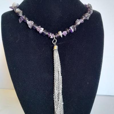 Three beaded necklaces one with matching bracelets