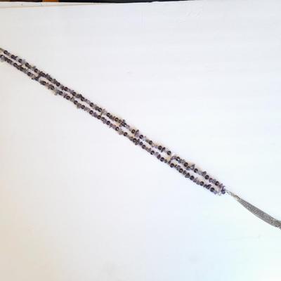 Three beaded necklaces one with matching bracelets
