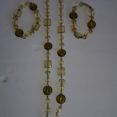 Three beaded necklaces one with matching bracelets