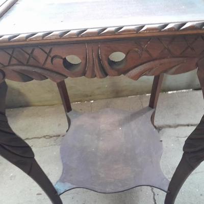 Antique wooden two-tiered table with faux clock music box