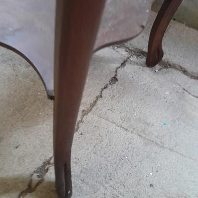 Antique wooden two-tiered table with faux clock music box
