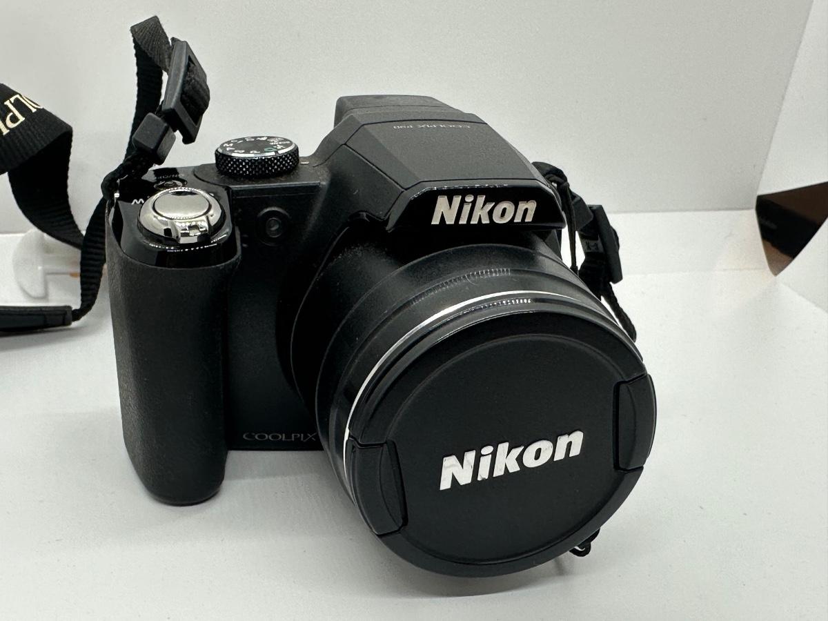 Nikon Coolpix P90 12.1 MP 24x / 4x 3.0" LCD Digital Camera w/Charger