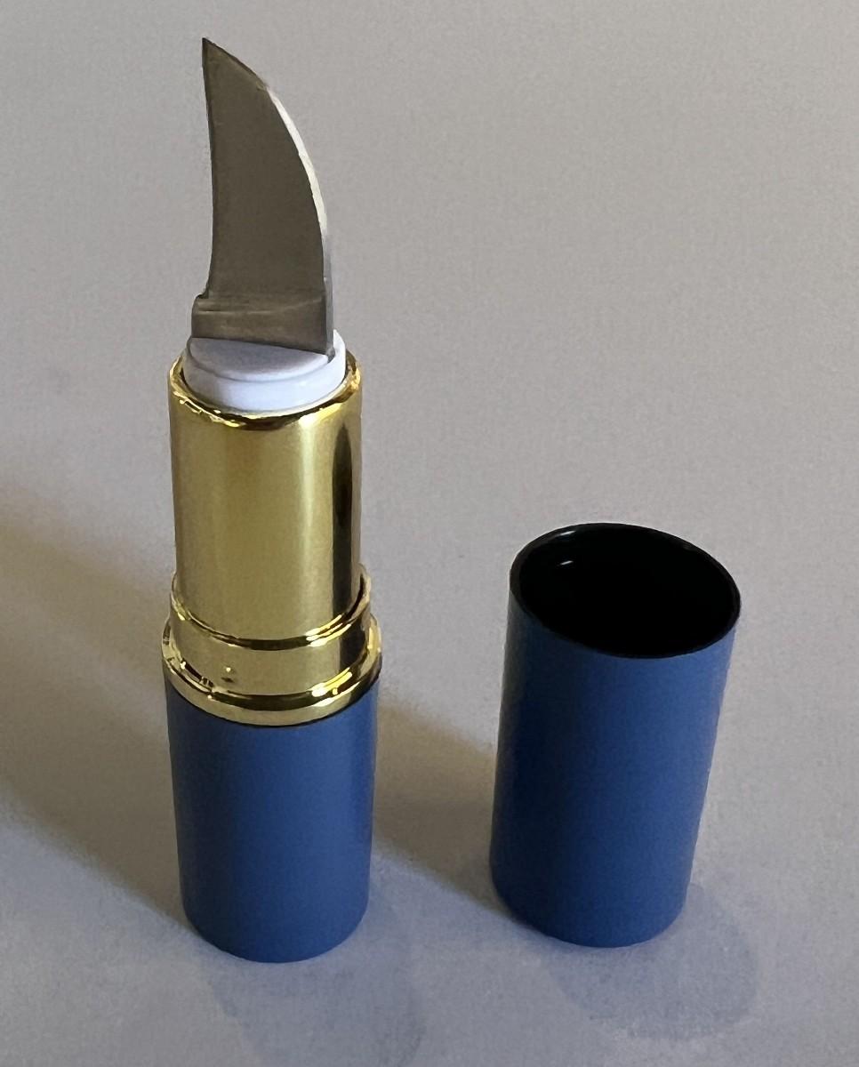 Lipstick case pocket knife prop