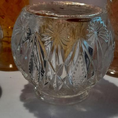 Avon bottles, vintage Paden City Pottery plate and peacock bowls