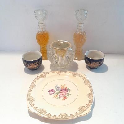 Avon bottles, vintage Paden City Pottery plate and peacock bowls