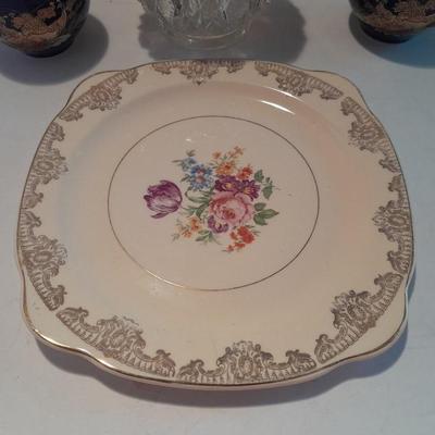 Avon bottles, vintage Paden City Pottery plate and peacock bowls