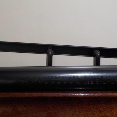 Remington Model 870 Magnum, 12 gauge. est. $300 to $600.