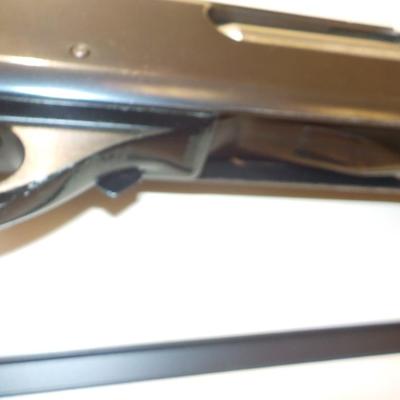 Remington Model 870 Magnum, 12 gauge. est. $300 to $600.