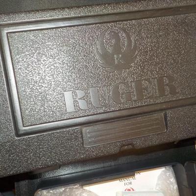 Ruger SR9 semi auto pistol, NEW with papers & lock case. Est. $300 to $600.