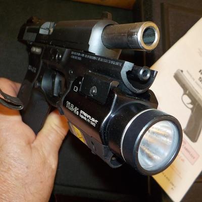 Ruger SR9 semi auto pistol, NEW with papers & lock case. Est. $300 to $600.
