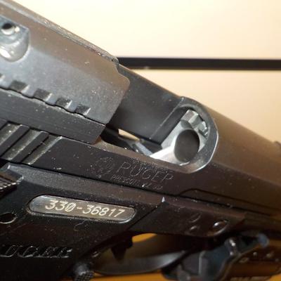 Ruger SR9 semi auto pistol, NEW with papers & lock case. Est. $300 to $600.