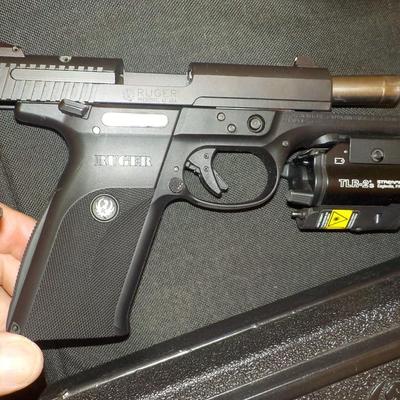 Ruger SR9 semi auto pistol, NEW with papers & lock case. Est. $300 to $600.