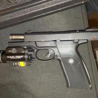 Ruger SR9 semi auto pistol, NEW with papers & lock case. Est. $300 to $600.