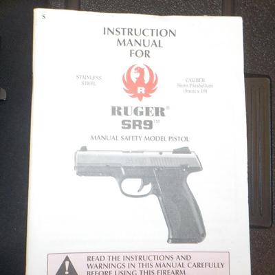 Ruger SR9 semi auto pistol, NEW with papers & lock case. Est. $300 to $600.