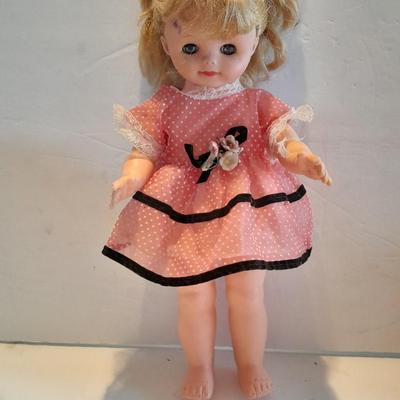 Plastic blonde doll with pig tails and Unknown brand Antique Kewpie like cloth with painted face doll