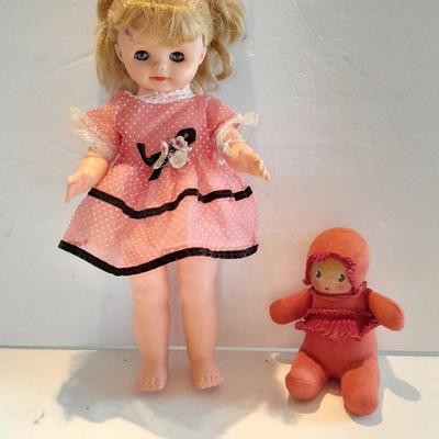 Plastic blonde doll with pig tails and Unknown brand Antique Kewpie like cloth with painted face doll
