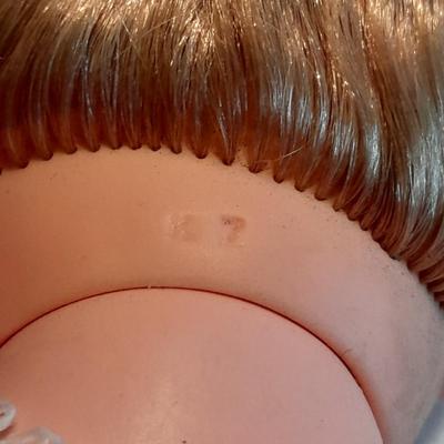 Plastic blonde doll with pig tails and Unknown brand Antique Kewpie like cloth with painted face doll