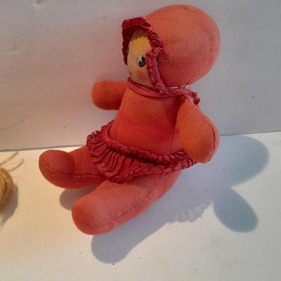 Plastic blonde doll with pig tails and Unknown brand Antique Kewpie like cloth with painted face doll